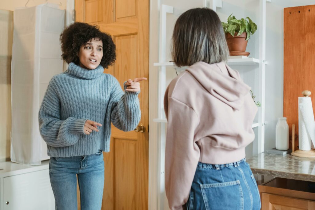 Two young women insulting each other